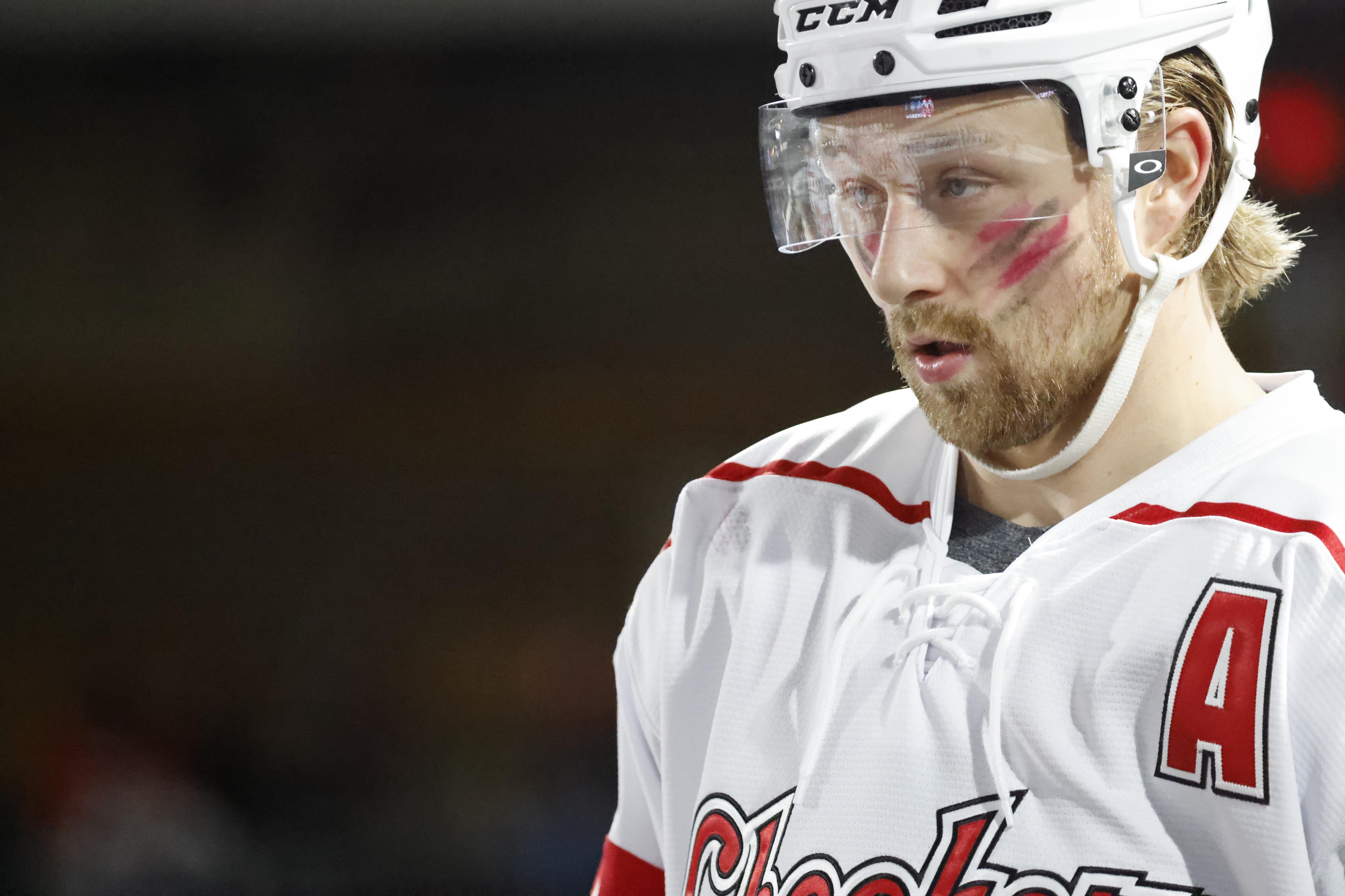Rasmus Asplund in hockey gear, close-up