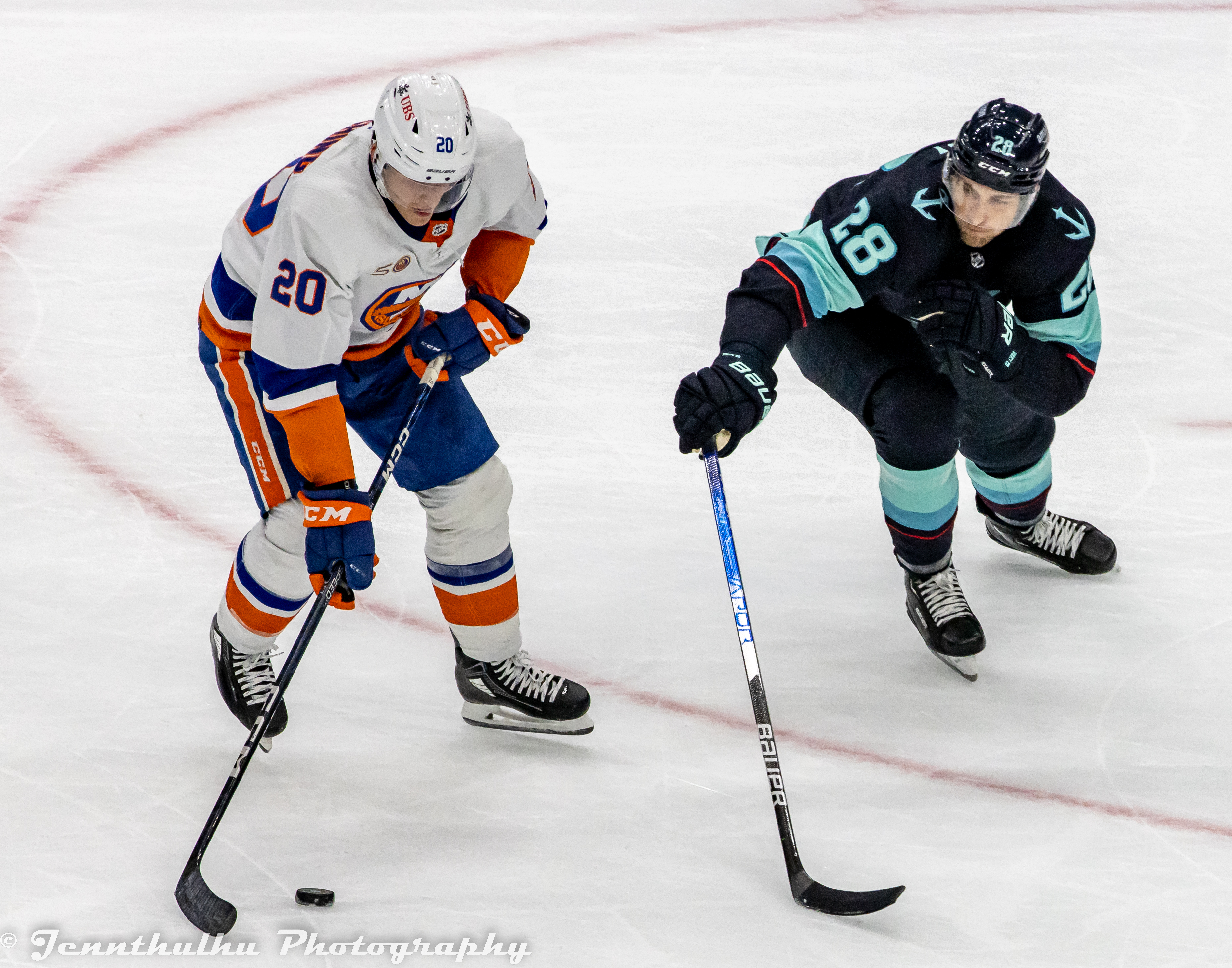 Hudson Fasching and Carson Soucy on the ice during a game