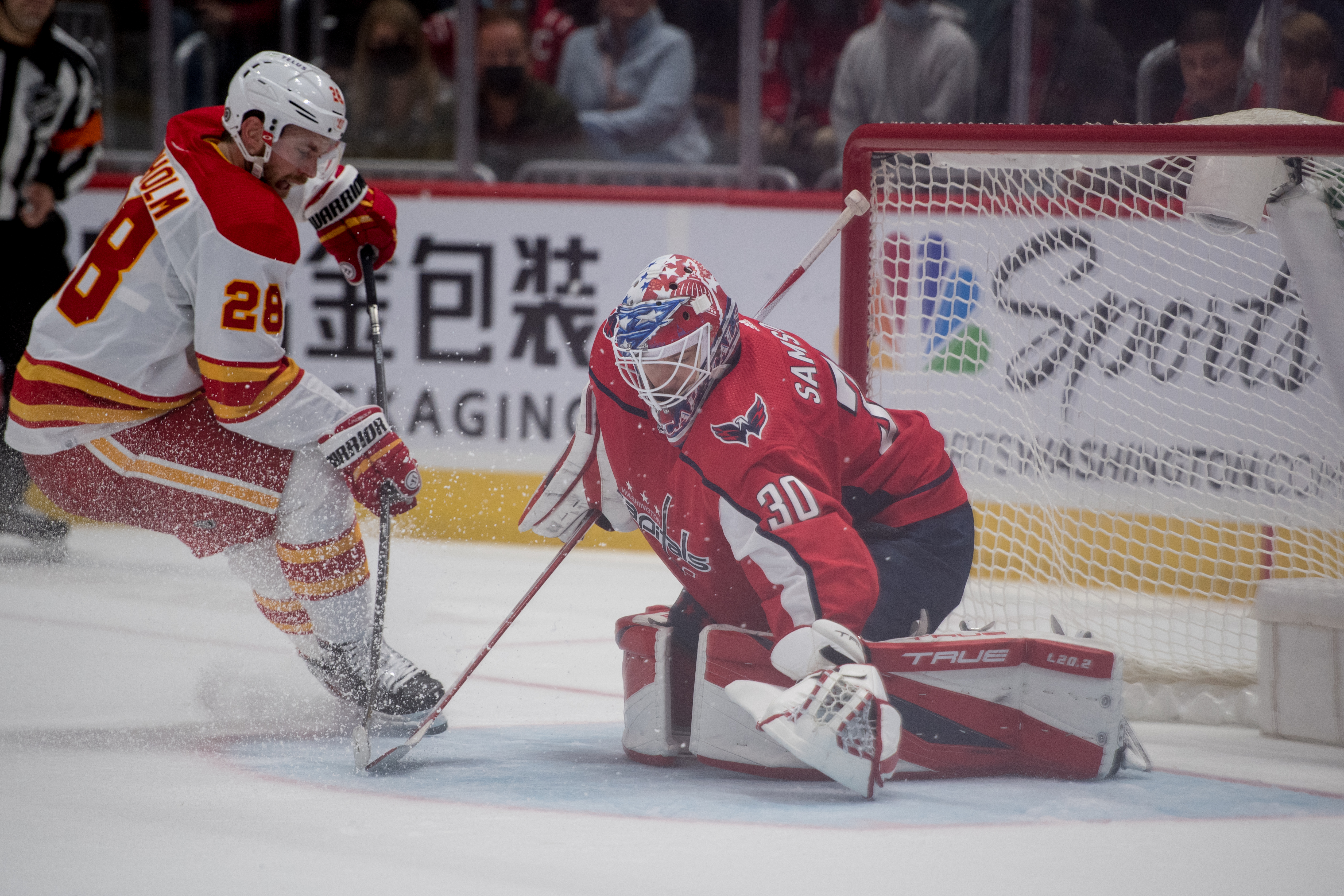 Ilya Samsonov attempting a save against the Calgary Flames