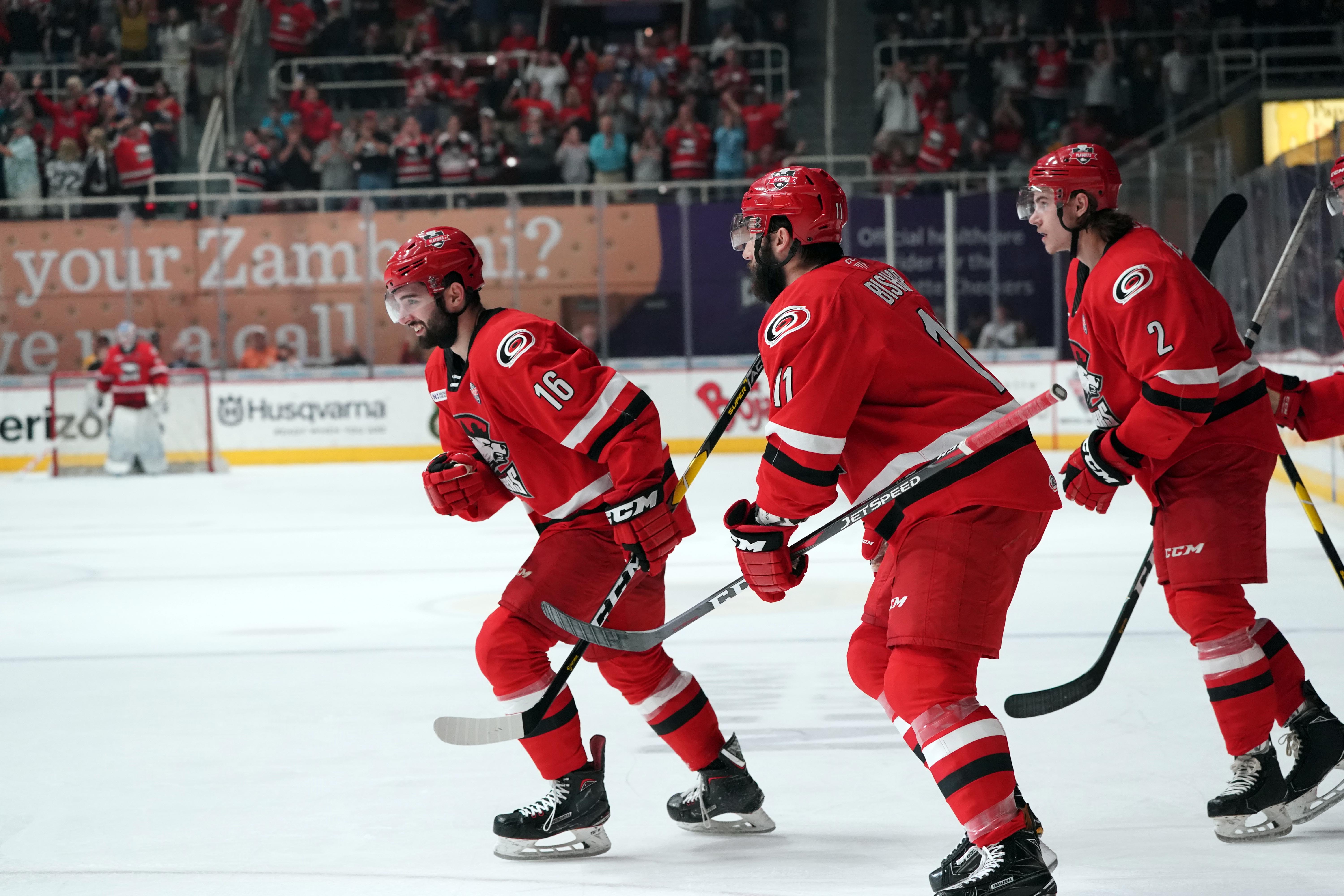 Clark Bishop on ice with teammates during 2019 Calder Cup Finals