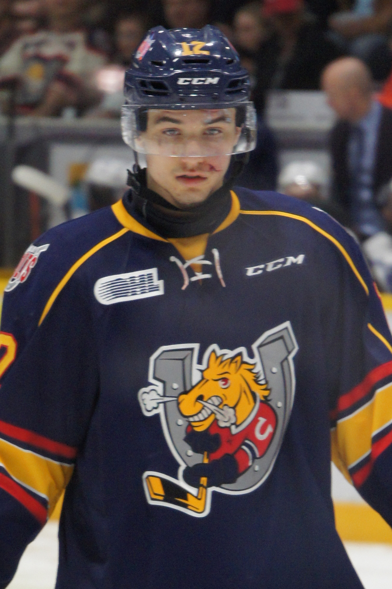 Kevin Labanc in Barrie Colts uniform skating with the puck