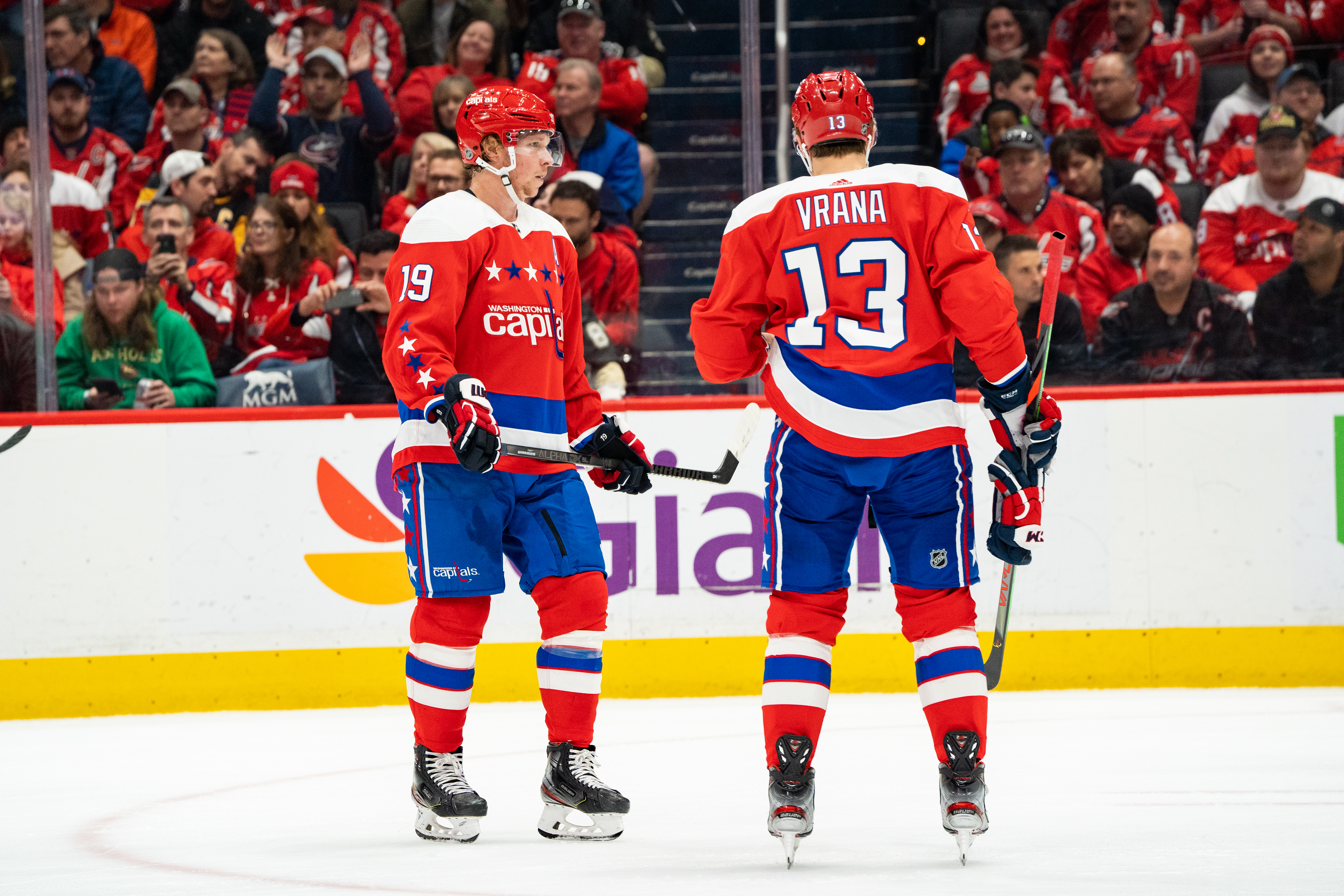 Nicklas Bäckström and Jakub Vrana on the ice in Washington