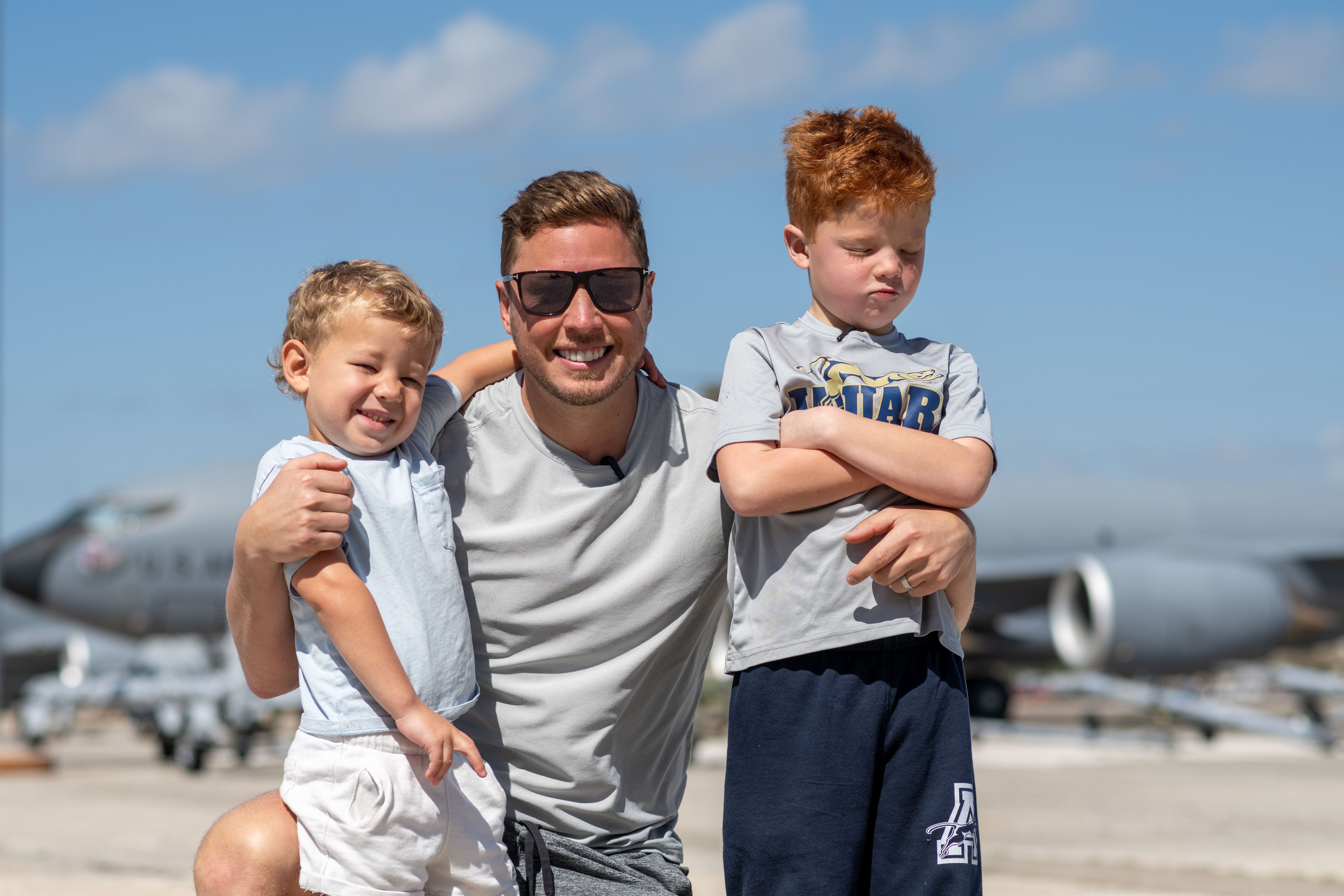 Cam Atkinson posing with his sons during a MacDill AFB tour