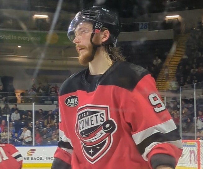 Daniil Misyul wearing an Utica Comets jersey
