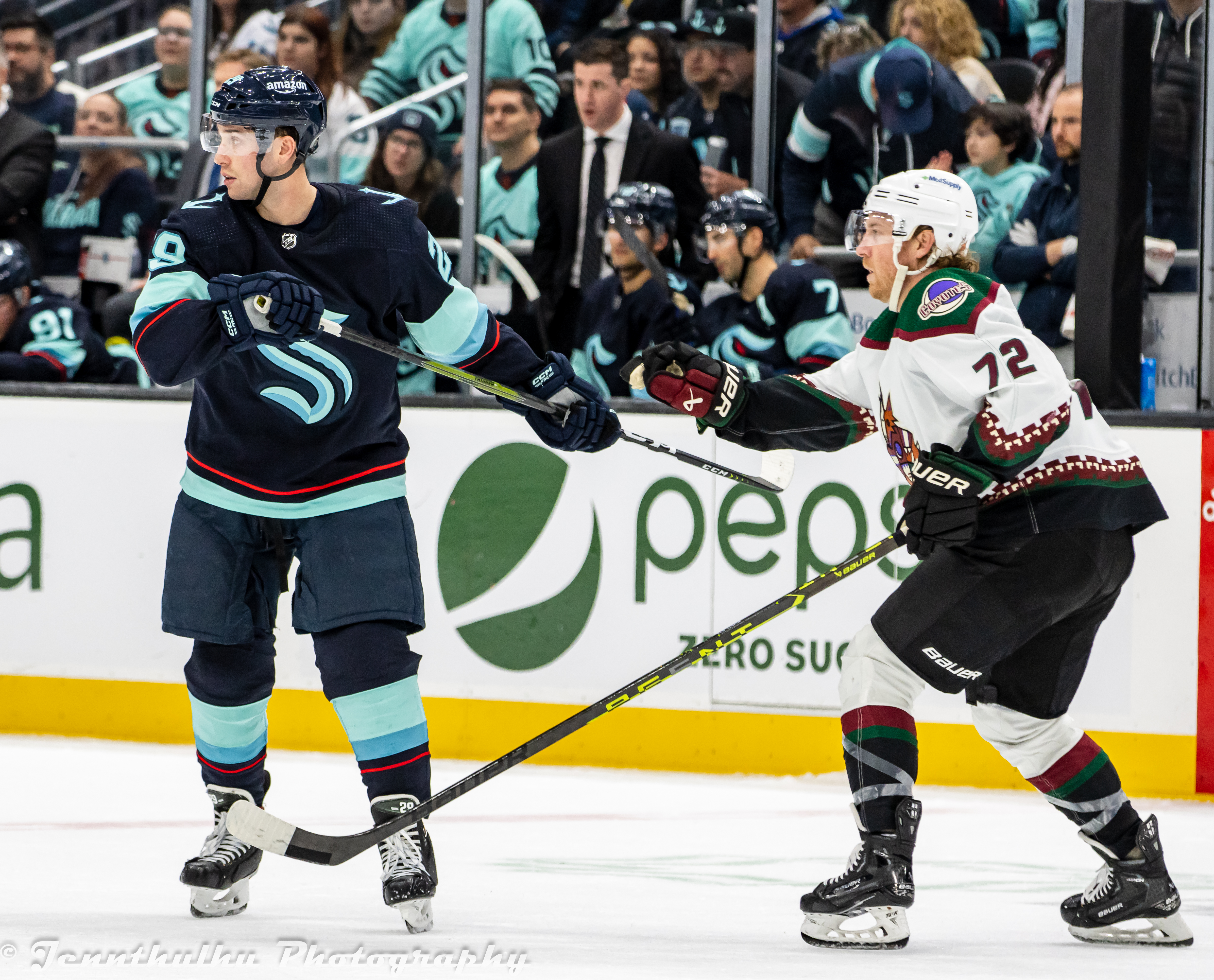 Travis Boyd in Arizona Coyotes uniform on the ice