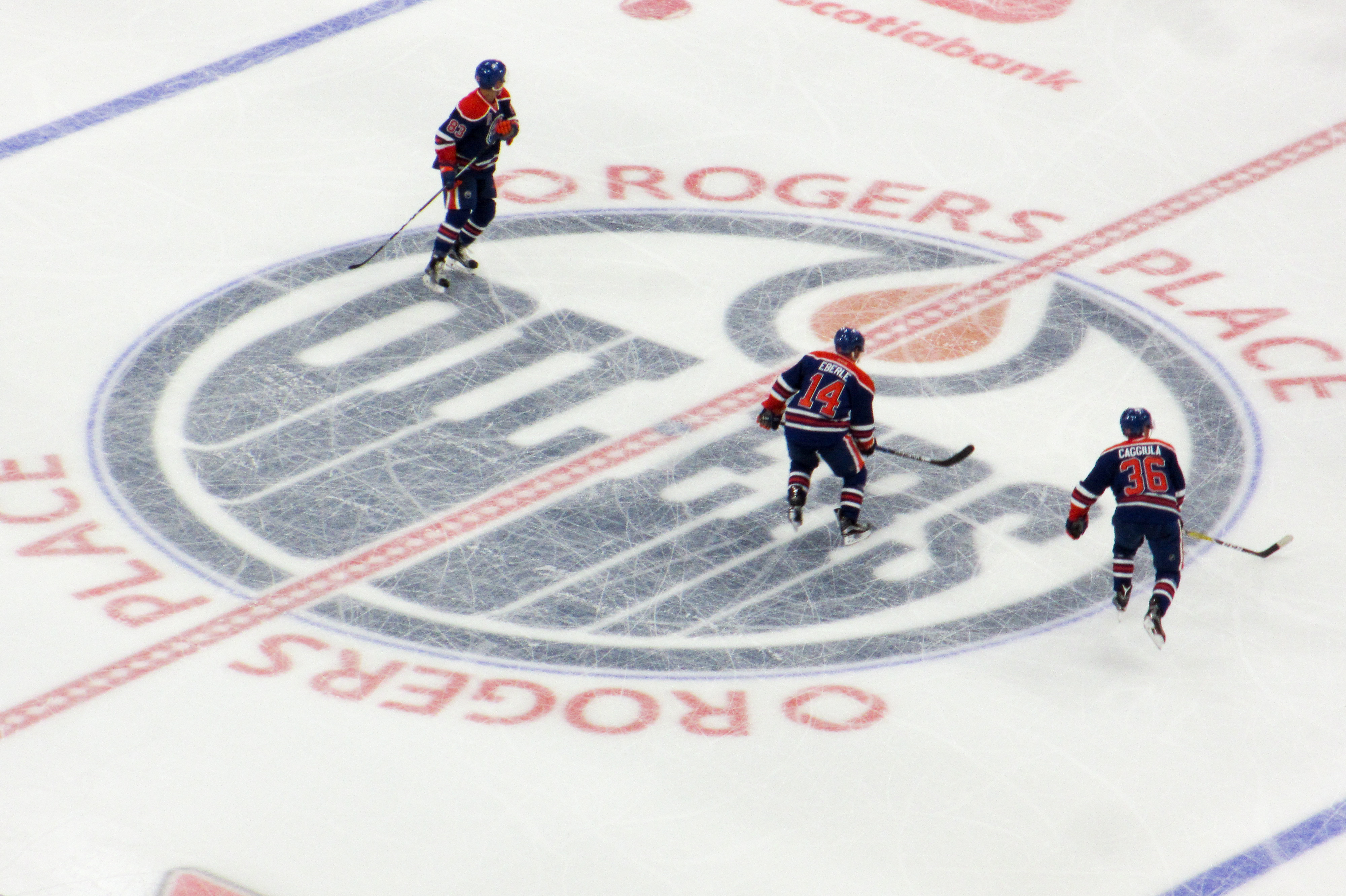 Drake Caggiula wearing an Oilers jersey in a pre-season game at Rogers Place